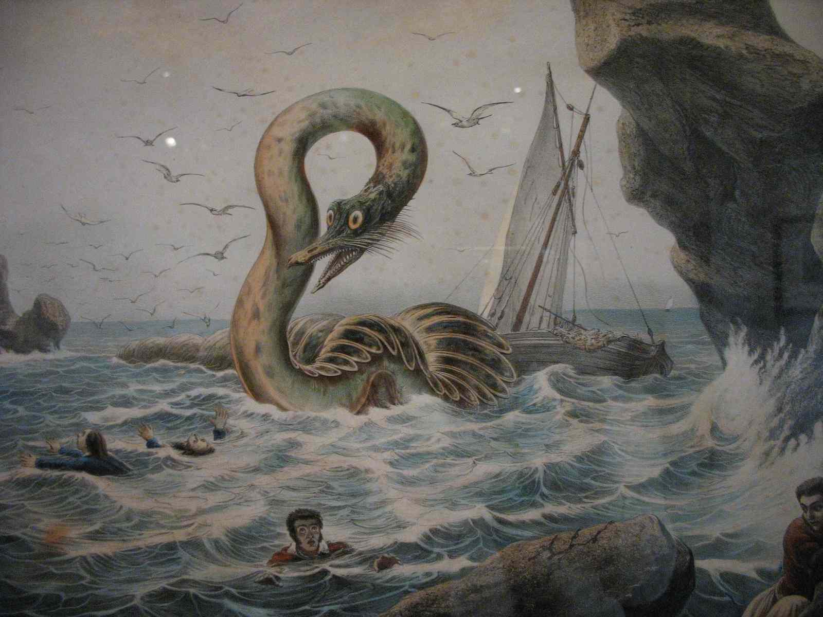A painting of a giant sea serpent at the base of a cliff. Terrified
